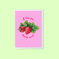 A pink greeting card with an illustration of three strawberries and green leaves, with the words 'I love you' and 'berry much' in red script, shown on a pale green background.