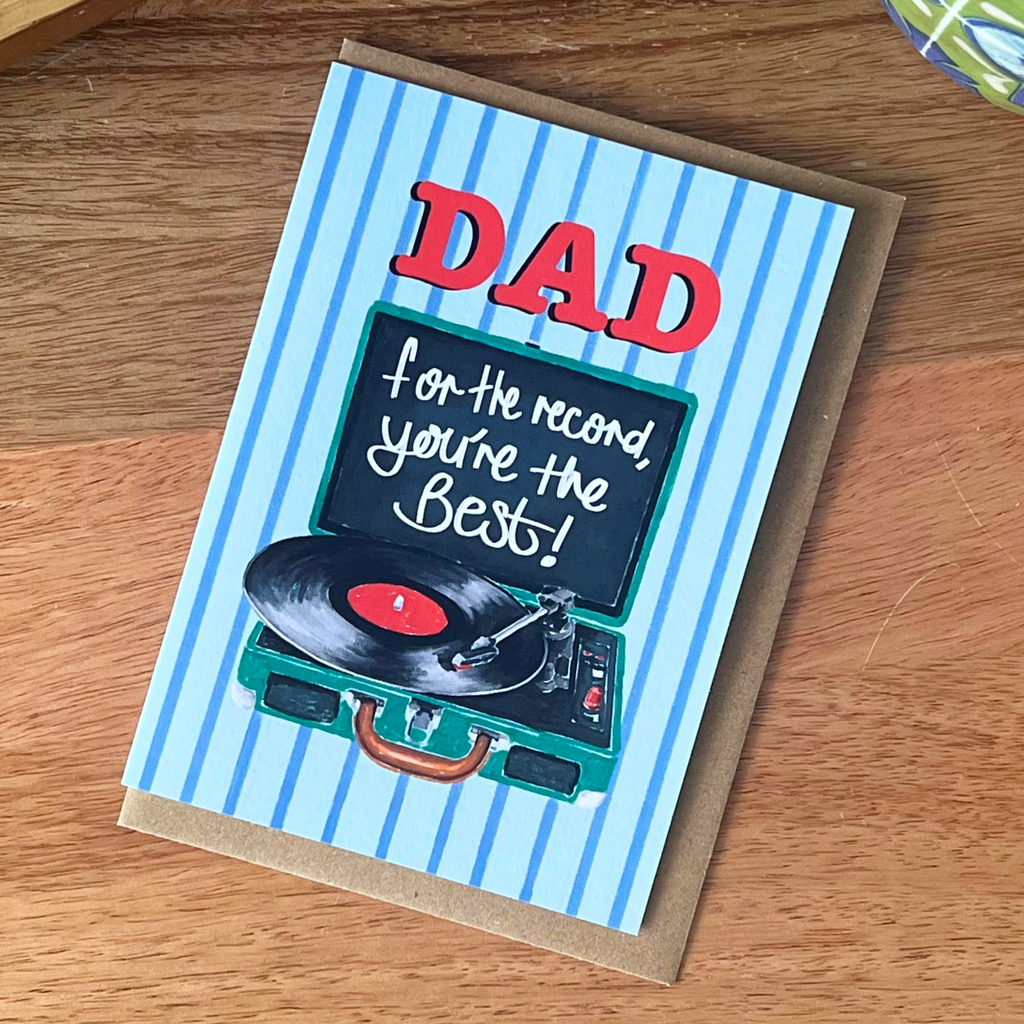 Greeting card for Dad with record player illustration on a wooden surface
