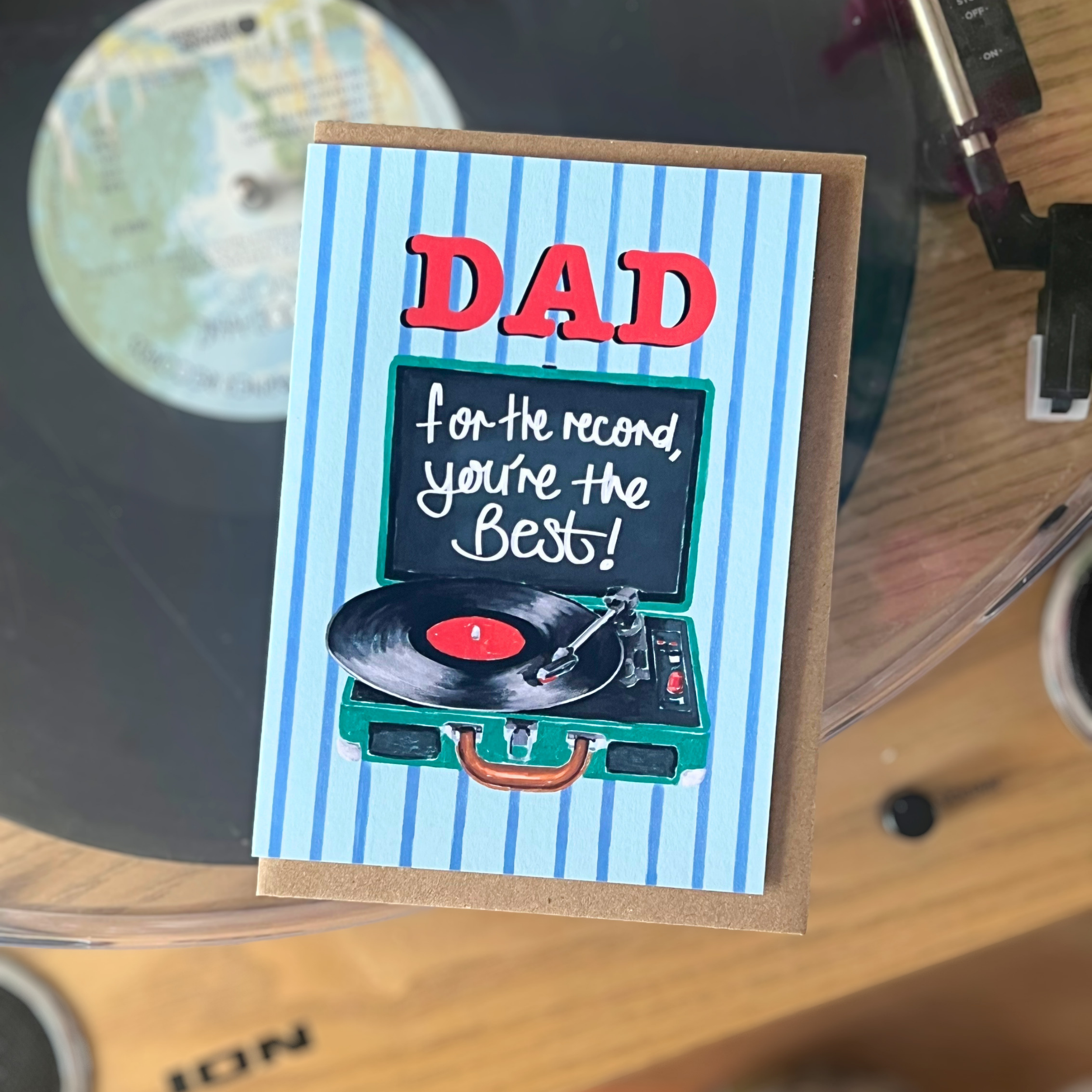 Greeting card for Dad with record player illustration on a vinyl record background