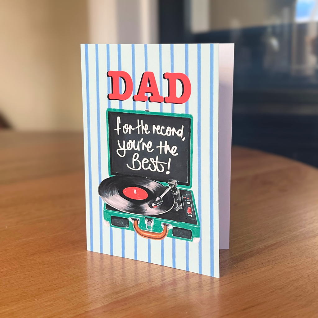 Greeting card for Dad with record player illustration on a wooden surface