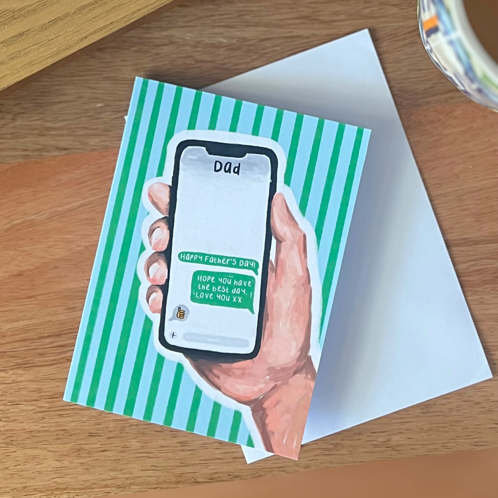 Father’s Day card with a hand holding a smartphone on a striped background