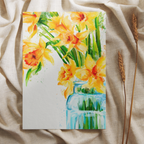 art print of watercolour daffodils in a blue vase on a natural linen background