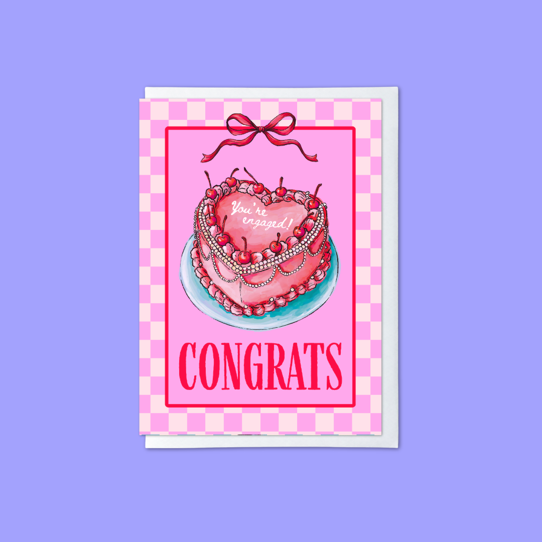 A pink congratulations card featuring an illustration of a cherry cake with the words 'You are engaged!' and the word 'CONGRATS' in bold pink letters, shown against a light purple background.
