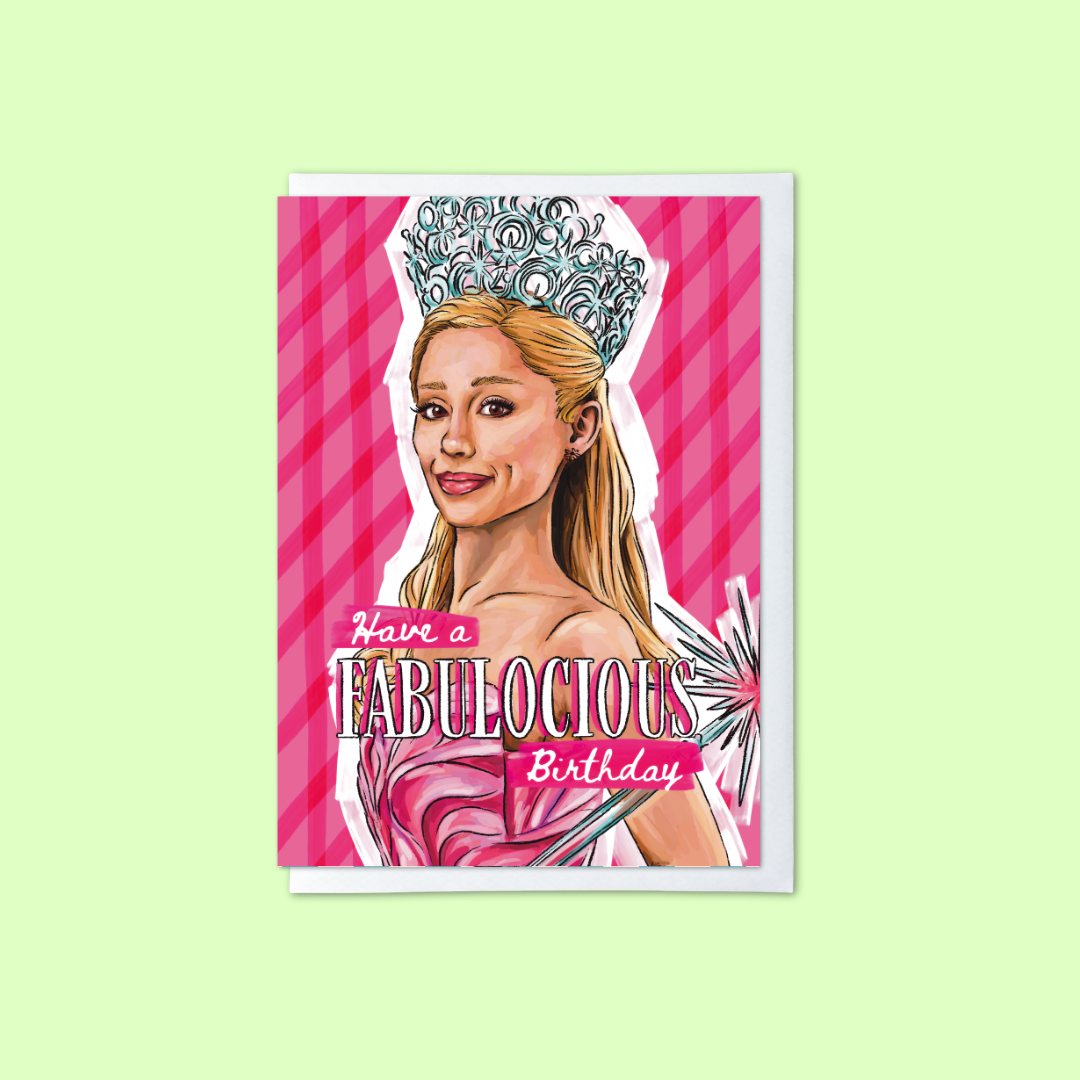 A greeting card featuring a stylized illustration of a woman wearing a tiara and pink dress, with the text 'Have a FABULOCIOUS Birthday' on a pink striped background, shown against a pale green backdrop.
