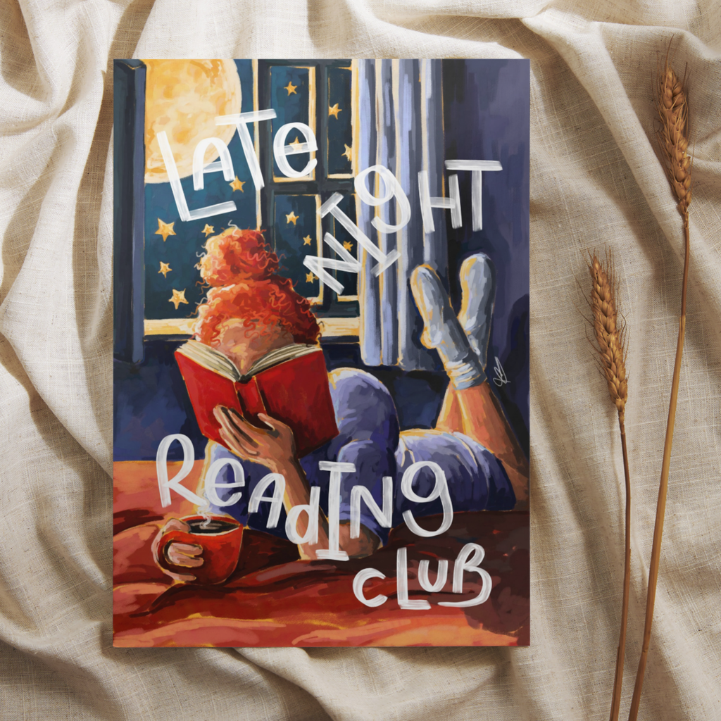 Art print of a woman reading in bed by a window with 'Late Night Reading Club' text, placed on a neutral background