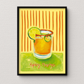 Framed artwork of a cocktail with lime slices on a yellow background