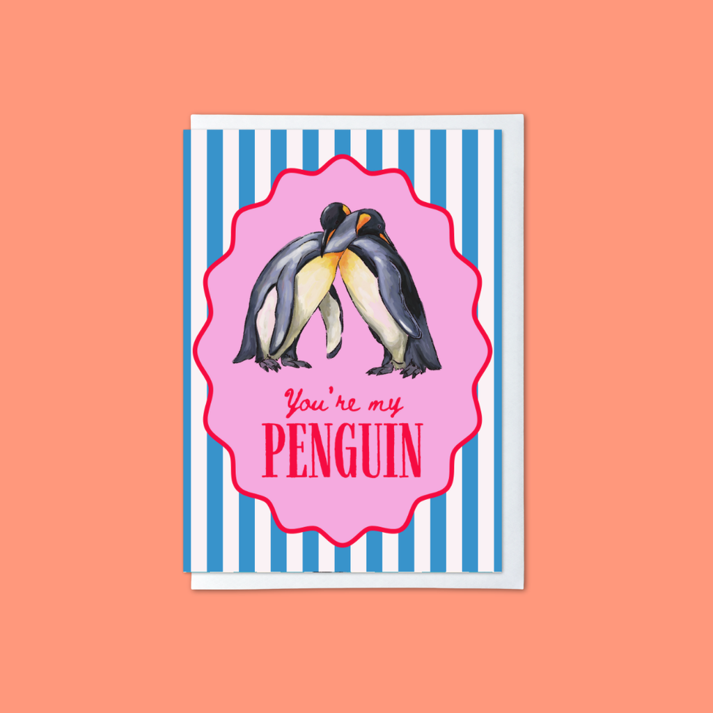 blue and white striped card with penguin hugging illustration in a pink frame and ‘you’ re my penguin’ message